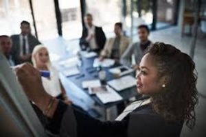 Ghanaian business leaders collaborating in a meeting